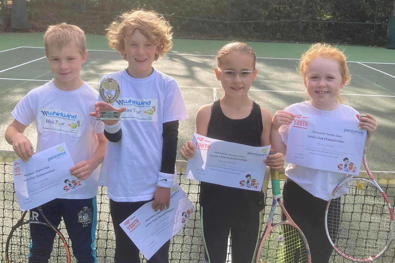 Junior Mini Tour players with trophy and certificates