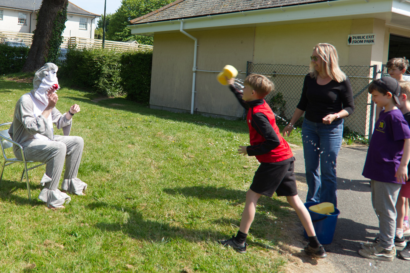 Head coach Ian getting wet with soak the coach